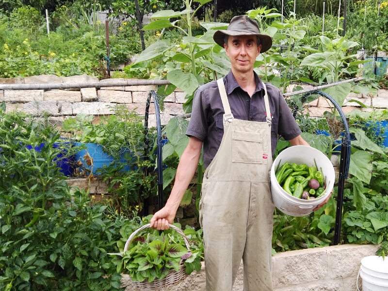 Jean holding vegetables