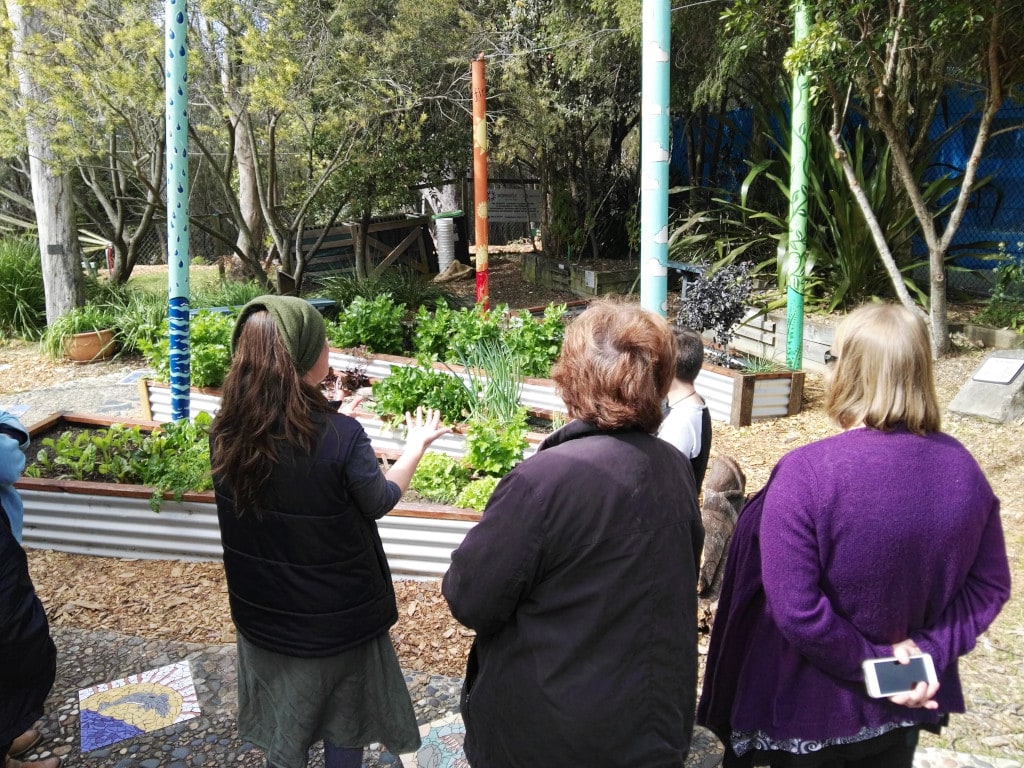 Lisa showing the garden to members