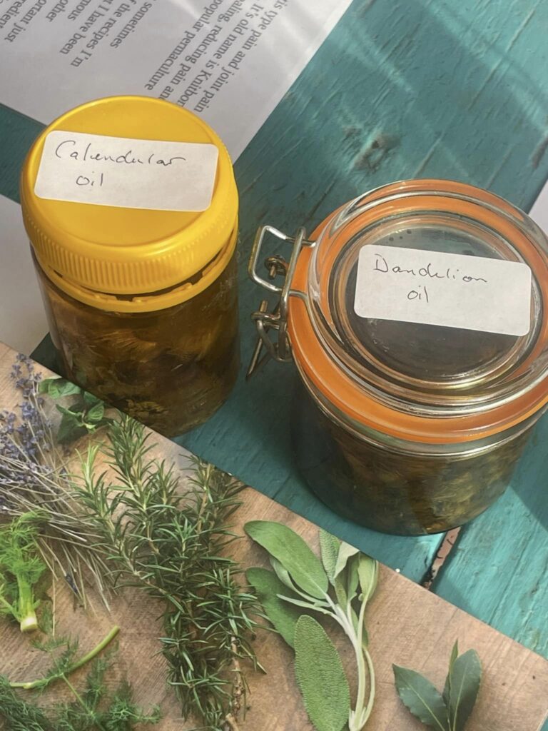 Jars of home-made calendula and dandelion oil